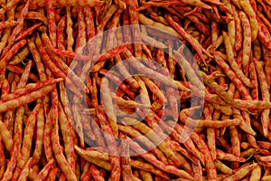 Red bean string close up. background: green wax beans