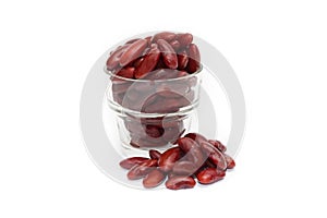 Red beans boiled in a glass on a white background