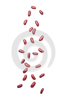 Red beans falling isolated on the white background