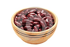 Red beans in wooden bowl isolated on white background