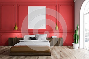 Red bedroom interior with poster
