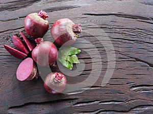 Red beet or beetroot on the wooden table.