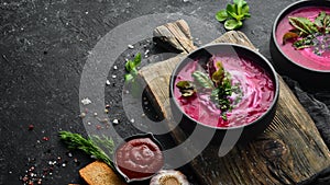 Red beet soup with sour cream. Ukrainian cuisine, Borsch soup. Top view. Free space for your text.