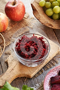 Red beetrood salad in a glass bowl
