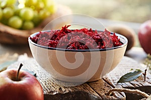 Red beetrood salad in a white bowl