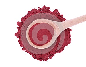 Red beetroot powder and wooden spoon