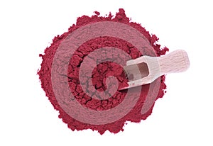 Red beetroot powder and wooden spoon