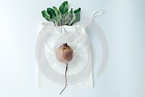 Red beets on a white background. creative concept of eco friendly bags and save the world from plastic waste