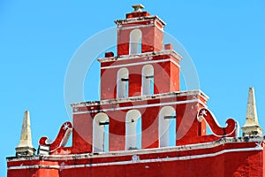 Red Belfry of the san juan de Dios temple in merida yucatan, mexico I photo