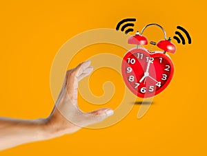 Red bell alarm clock wake up at 7 o`clock