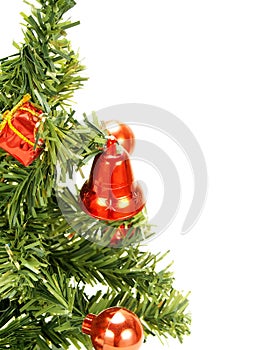 Red bell, baubles hanging on Christmas tree