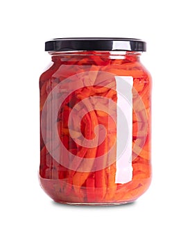 Red bell peppers, pickled sweet pepper slices, in a glass jar