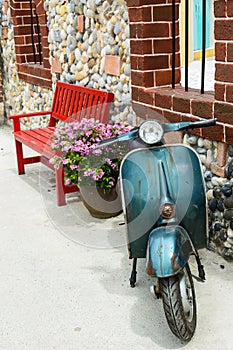 Red bench with flowers