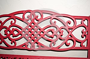 red bench isolated on white wall