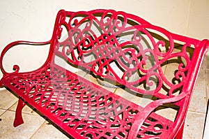 red bench isolated on white wall