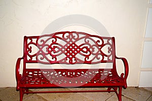 red bench isolated on white wall