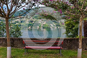 Red Bench Overlooking Lake Lugano in Switzerland