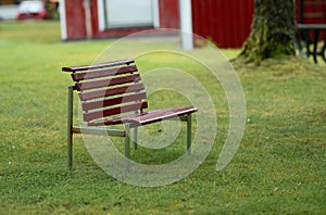 Red bench in a park..