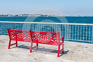 Red Bench on Pier at Cesar Chavez Park photo