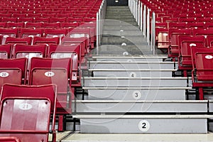 Red benches at the stadium tribune