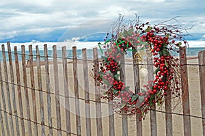 red berry Christmas wreath with tropical starfish