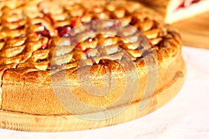 Red berry pies on white background