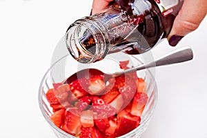 Red berry sliced on a white background.