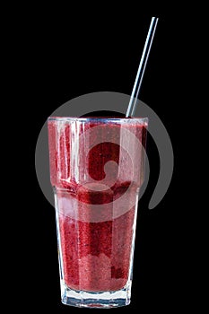 Red berry smoothie in a large glass