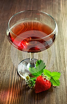 Red beverage with strawberries