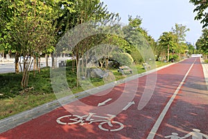 Red bicycle path and health walkway by the Yongjiang river, adobe rgb