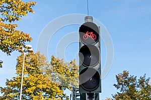 Red bicycle traffic light in the city