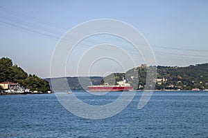 A red big freighter in Bosphorus