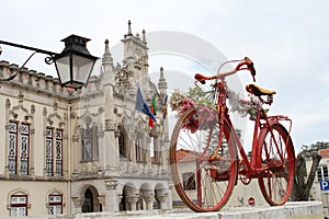Red bike in Sintra Portugal photo