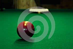 Red billiard ball