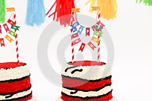 Red birthday cakes for twins
