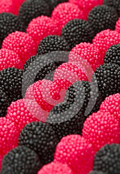 Red and black blackberries candy