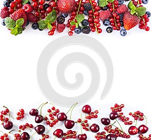 Red and black-blue fruits and berries. Ripe red currants, strawberries, raspberries, blackberries, blueberries, cherries and black