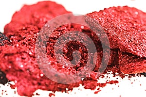 Red and black color crumbled eye shadows