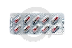 Red and black color gelatin capsules pills in blister pack