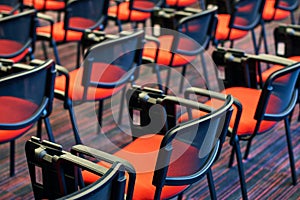 Red and black conference chairs in the auditorium