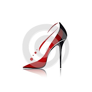 A red and black high heeled shoe with a white background