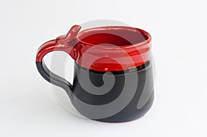 Red and black pottery mug