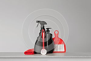 Red and black set of tools and tools for cleaning the kitchen.