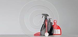 Red and black set of tools and tools for cleaning the kitchen.