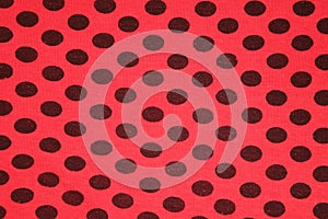 Red with black spots textile texture