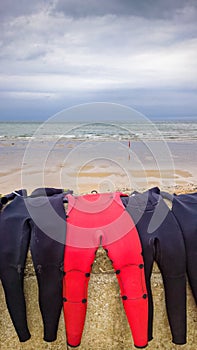 Red and Black Surfing Wetsuits