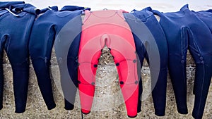 Red and Black Surfing Wetsuits