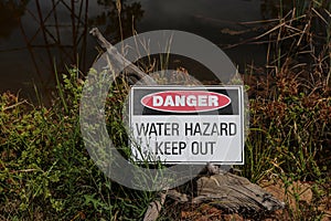 Red, black and white Danger, Water Hazard Keep Out warning sign