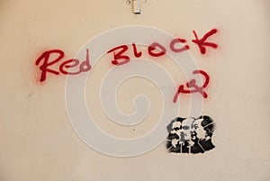 Red block graffiti on a wall