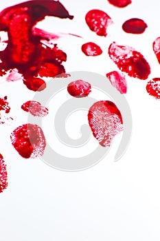 Red Bloody fingerprints on the white background. Horror and crime scene concept. Halloween postcard
